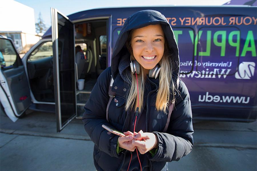 Student takes the campus shuttle from University of Wisconsin Rock County to the University of Wisconsin Whitewater campus.