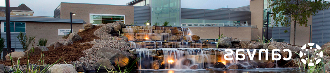 Waterfall on campus in front of building