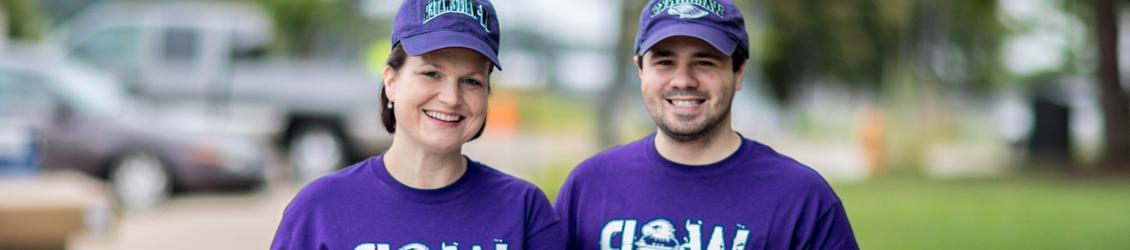 Mother and her son dressed in UWW apparel